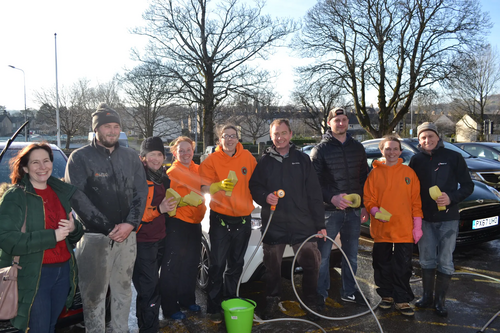 Tim washing cars for Grayrigg School