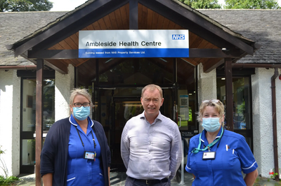 Tim with local district nurses outside Ambleside Health Centre