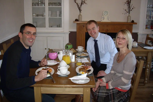 Tim with the owners of Lingmoor House B&B, Windemere