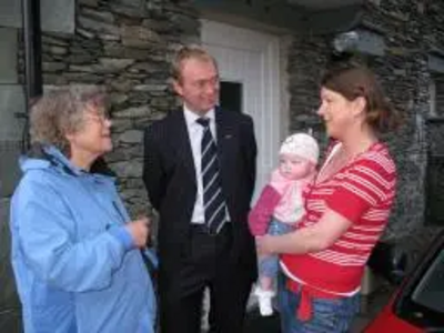 Tim Farron MP and Cllr Vivienne Rees visiting an affordable home in Grasmere