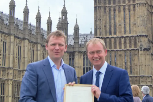 William Wordsworth’s great-great-great-great-grandson Christopher Wordsworth presenting Tim with a framed copy of this year’s winning poem by Jacob Currie.