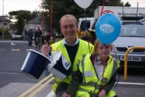 Tim Farron MP with his daughter Gracie at Torchlight