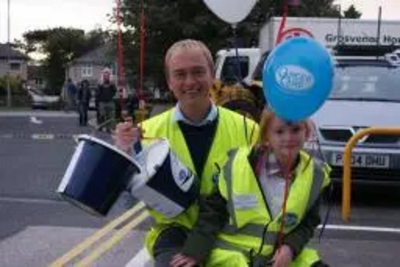 Tim Farron MP with his daughter Gracie at Torchlight