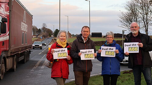 Lib Dem campaigners by the A66