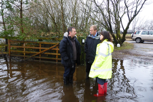 Tim with local residents near Levens after Storm Desmond in 2015