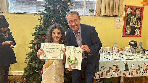 Tim with Christmas card competition winner Anna Kay