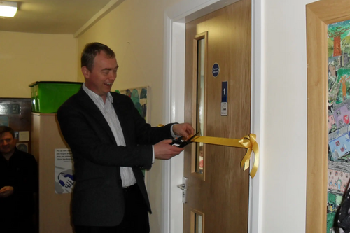 Tim opening a new classroom