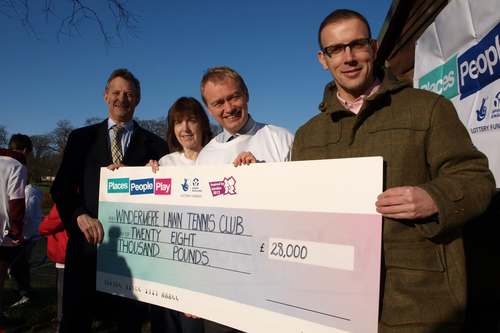 Tim joins county councillor Jo Stephenson to welcome the grant for Windermere tennis club from Sport England