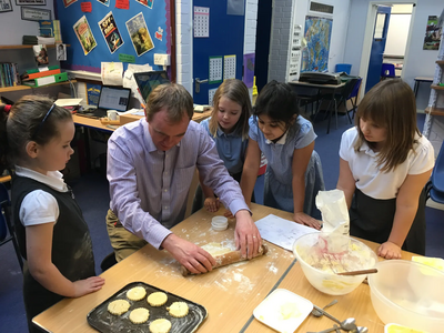 Tim Farron MP baking with Heron Hill Primary School pupils