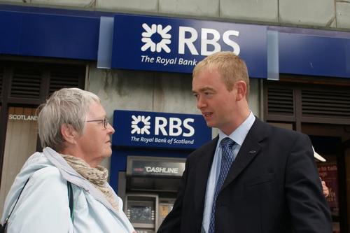 Tim with local resident outside RBS bank in Kendal