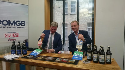 Tim Farron MP and Jamie Reed MP pulling pints