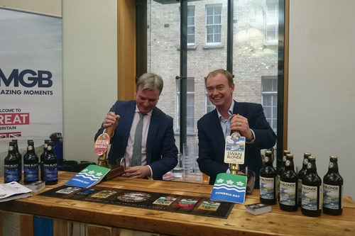 Tim Farron MP and Jamie Reed MP pulling pints