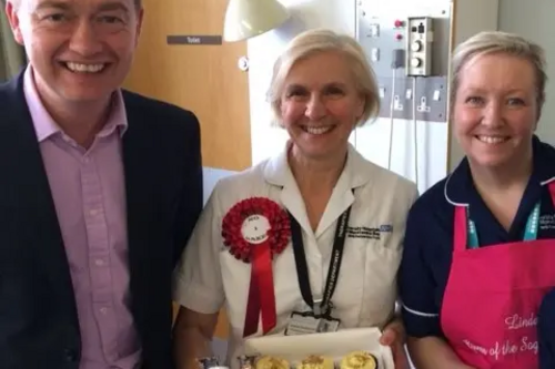 Tim with NHS staff at the Bake-Off