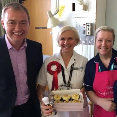 Tim with NHS staff at the Bake-Off