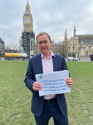 Tim with the petition outside Parliament