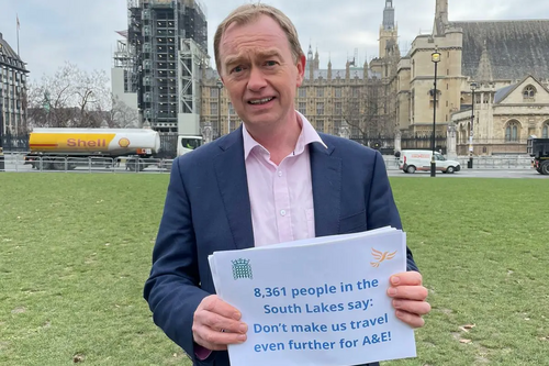 Tim with the petition outside Parliament