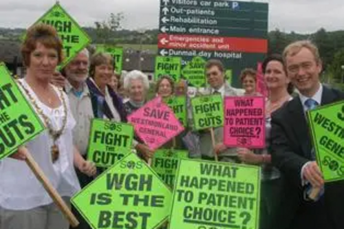 Tim and NHS SOS campaigners celebrate the cardiac unit victory