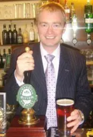 Tim pulls the first pint of Hawkshead bitter in the Stranger's Bar