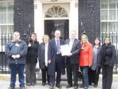 From left to right. Darren Osbourne, Cheryl Hudson, Wendy Ferrell, Tim Farron MP, David Borrow MP, Christine Steel, Debbie Osbourne, Dennisha Villaverde