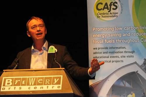 Tim Farron speaking at a climate change event