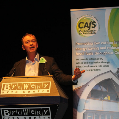 Tim Farron speaking at a climate change event