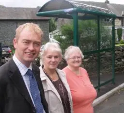 Tim with local residents at the modern bus shelter in Chapel Stitle