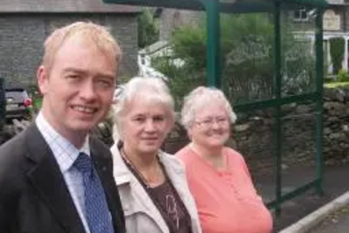 Tim with local residents at the modern bus shelter in Chapel Stitle