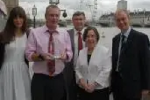 Tim Farron with his constituent Bob Whittall who was presented with an Animal Action award