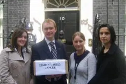 Tim Farron MP with cancer campaigners taking petitions to no. 10