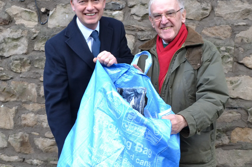 Tim and Eric Morrell with a recycling bag